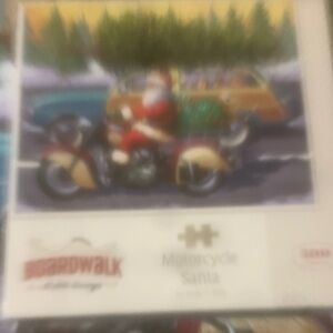 Puzzle by Boardwalk. 500ct. Motorcycle Santa